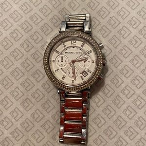 Silver woman’s Michael Kors watch